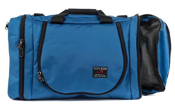 A Constellation (light blue) Ballistic Aeronaut 45 with the end pocket open showing the Northwest Sky (light-grey) Halcyon.